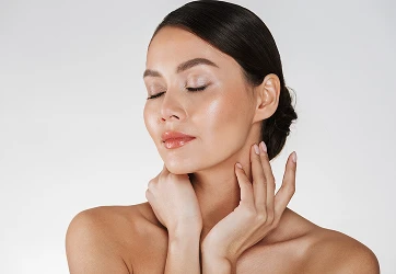 a woman with her eyes closed