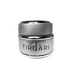 Silver and black cream jar with a lid, labeled "Tirgari."