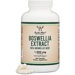 Bottle of Boswellia extract supplement with capsules beside it. 240 capsules, 1,000 mg per serving